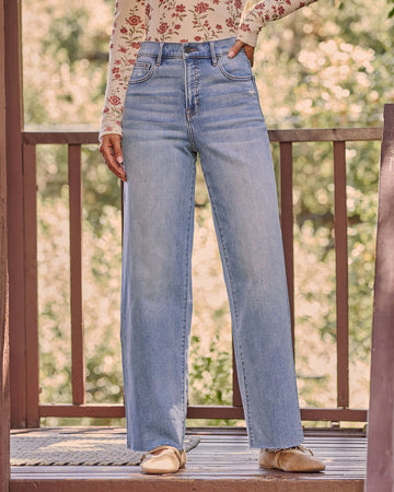 Logan Super Stretch High Rise Relaxed Raw Hem Jeans