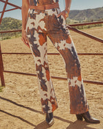 Prairie Rodeo Flare Leg Cow Print Pants
