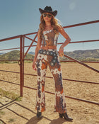 Prairie Rodeo Flare Leg Cow Print Pants