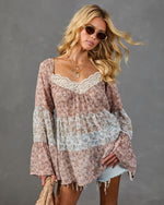 Boho floral patchwork babydoll top with lace trim, bell sleeves, worn with denim cutoffs and round sunglasses