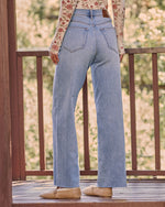 Logan Super Stretch High Rise Relaxed Raw Hem Jeans
