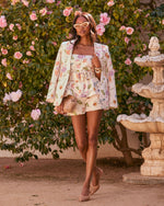 Daisy Weekend Belted Floral Peplum Top