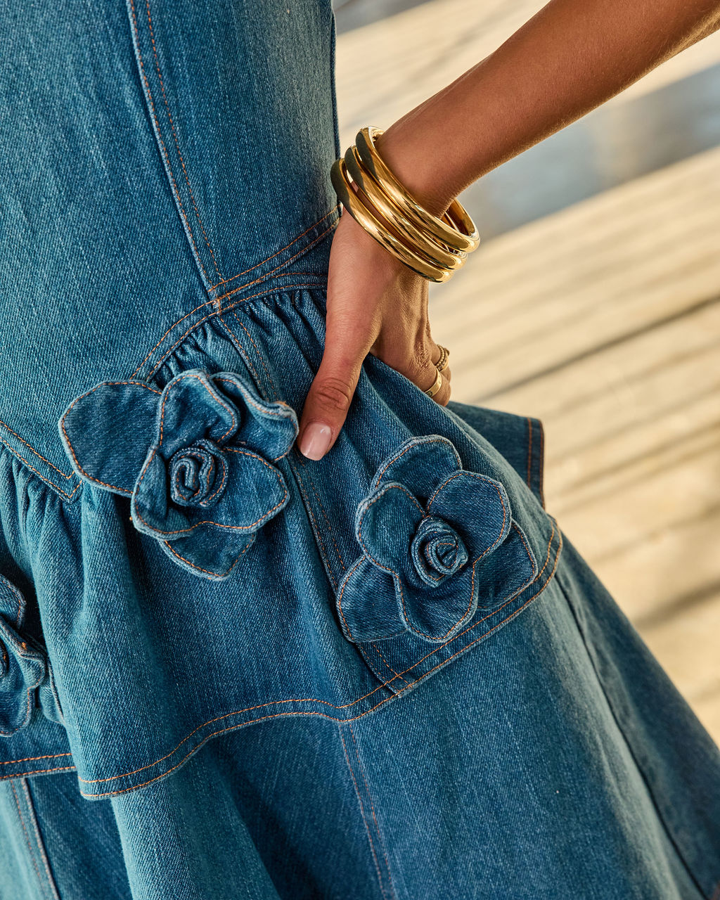 Denim Rose Peplum Rosette Mini Denim Dress in Medium Wash Denim Rose Peplum Rosette Mini Denim Dress in Medium Wash