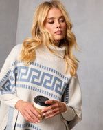 Maly Abstract Fringe Trim Poncho Sweater