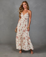 Cream floral maxi dress with pink roses, V-neck, spaghetti straps, tiered skirt, styled with gold jewelry and nude heels