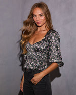 Undeniably Her Printed Peplum Top