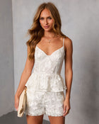 Midnight Renewal Embroidered Peplum Top