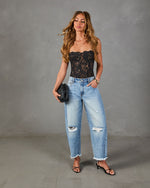 Reworked Frame Rigid Mid Rise Distressed Barrel Leg Jeans