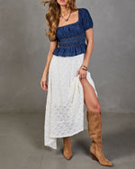 Navelle Smocked Denim Peplum Top