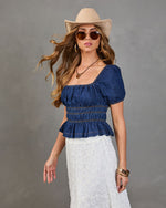 Navelle Smocked Denim Peplum Top