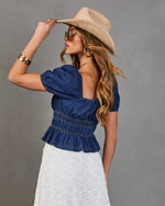 Navelle Smocked Denim Peplum Top