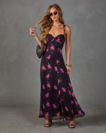 Black floral maxi dress with pink roses, tie shoulder straps, sweetheart neckline, worn with black heels and woven bag