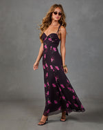 Black floral maxi dress with pink roses, spaghetti tie straps, sweetheart neckline, flowing skirt, styled with black heels