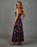 Dark floral maxi dress with pink roses on black, spaghetti straps, open back, worn with black heeled sandals