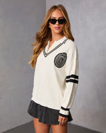 Jiles Embroidered Crest Partial Zip Sweater