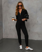 Black % Ryker Pocketed Half Zip Knit Jumpsuit-1