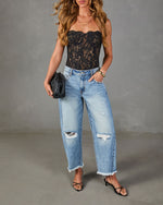 Reworked Frame Rigid Mid Rise Distressed Barrel Leg Jeans