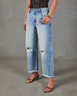 Reworked Frame Rigid Mid Rise Distressed Barrel Leg Jeans