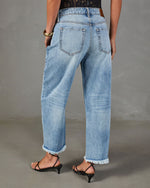 Reworked Frame Rigid Mid Rise Distressed Barrel Leg Jeans