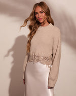 Cream ribbed knit crop sweater with floral lace hem trim, styled with ivory satin midi skirt on blonde model