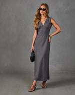 Gray lace-trim V-neck satin maxi slip dress styled with black strappy heels, woven clutch, gold bangles, and cat-eye sunglasses